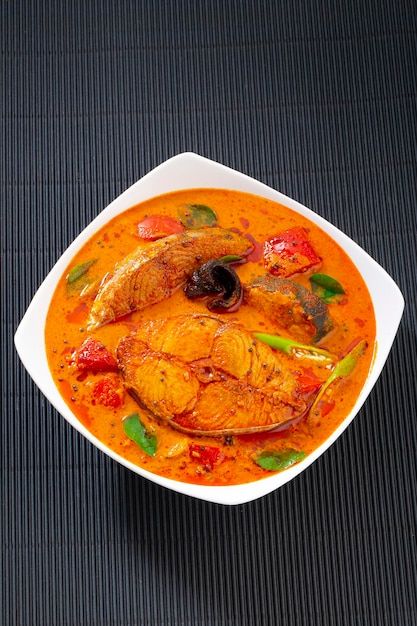 Photo fish curry_seer fish curry ,tradit... | Premium Photo #Freepik #photo #fish-curry #indian-curry #indian-dish #kerala-food Indian Fish Curry, Kerala Fish Curry, Fish Curry Indian, White Textured Background, Curry Indian, Coconut Fish, Kerala Food, White Bowl, Fish Curry