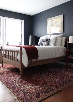 Persian rugs under bed gives this room the wow factor - dark wall colour like BM Hale Navy Jenny Lind Bed, Navy Blue Paint Colors, Navy Bedrooms, Ikea Pillows, Hale Navy, White Linen Bedding, Blue Paint Colors, Master Bed, Bedroom Paint