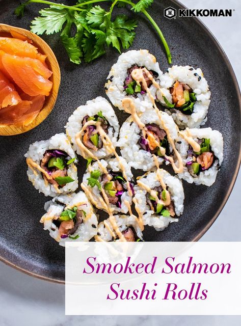 Smoked Salmon Sushi Rolls | If you’ve been craving a sushi night, why not serve homemade sushi for a cozy date night or family dinner? Take kitchen inspiration from a takeout-inspired sushi roll recipe – DIY sushi is easy and so fun to create together! Use your favorite veggies and proteins, then get the family involved in wrapping the rolls. It’s a fun activity with kids and creates a delicious meal for the whole family! Serve with Kikkoman® Less Sodium Soy Sauce for dipping. #Kikkoman Salmon Cream Cheese Sushi Roll, Sushi With Smoked Salmon, Smoked Salmon Sushi Recipes, Cooked Salmon Sushi Rolls, At Home Sushi Recipes, Smoked Salmon Sushi Roll, Smoked Salmon Rolls, Salmon Sushi Recipes, Easy Sushi Rolls