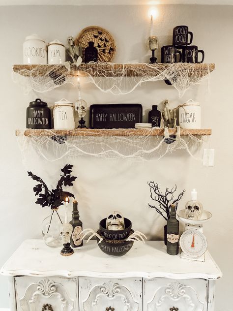 Halloween Black And White Decor, Halloween Kitchen Shelf Decor, Halloween Built Ins Decor, Halloween Shelf Decor Ideas, Halloween Buffet Decor, Rae Dunn Halloween Display, Halloween Shelves, Halloween Shelf Decor, Halloween Booth