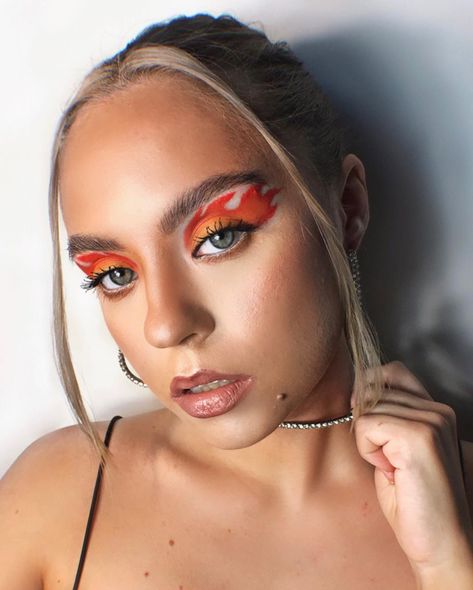 Flames Rave Outfit, Flame Inspired Makeup, Flames Makeup Look, Flame Graphic Liner, Fire Costume Makeup, Flames Eyeliner, Flame Face Paint, Flame Eyeliner, Flame Eye Makeup