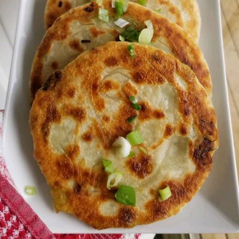 Chinese Scallion Pancakes Recipe | Allrecipes Chinese Scallion Pancakes, Chinese Buns, Scallion Pancakes Chinese, Scallion Pancake Recipe, Chinese Pancake, Chinese Meals, Pot Roast Crock Pot Recipes, Asian Appetizers, Savory Cakes