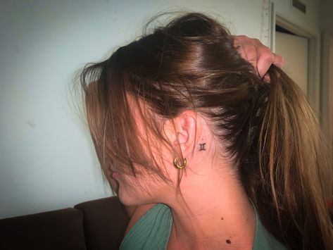 Behind Ear Tattoo Gemini, Initial Tattoo On Back Of Neck, Pisces Symbol Tattoo Behind Ear, Zodiac Behind Ear Tattoo, Gemini Tattoo Behind The Ear, Aries Tattoo Behind The Ear, Small Gemini Tattoo For Women Behind Ear, Pisces Ear Tattoo, Peace Sign Tattoo Behind Ear