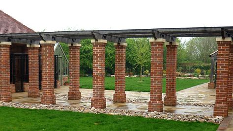 brick Brick Pergola, Brick Pillars, Hickory Kitchen Cabinets, Clay Bricks, Contemporary Kitchen Remodel, Wood Walkway, Brick Columns, Elegant Kitchen Design, Garden Canopy