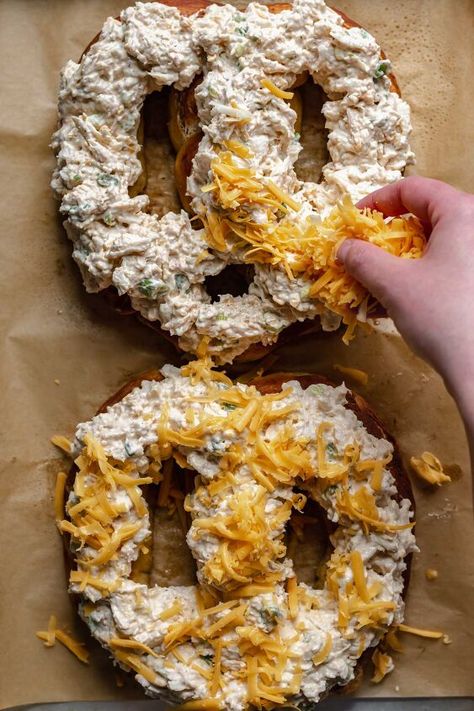 This homemade version of a staple Maryland appetizer, the Crab Pretzel, is a perfect addition for your next gathering. Jumbo, chewy homemade soft pretzels are topped with lump crab dip and melted cheddar cheese - and don't forget the Old Bay! If you're looking for the ultimate crowd pleasing appetizer, this jumbo crab pretzel is it! And let's be honest, this is not a delicate eat. You'll be scraping up every last bit of crab dip that falls off (and it will fall off) followed by a lic… Crab Pretzel, Crab Pretzel Recipe, Prosciutto Asparagus, Cheddar Cheese Recipes, Pretzel Dough, Pretzel Shape, Homemade Soft Pretzels, Crab Dip, Pretzel Dip