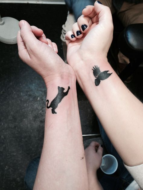 Best friend tattoos. Work together and separately! My friend Kat got the playful cat and I got a raven for my love of birds, the brilliant Corvids and a little bit of Charm City pride!  #tattoos #bestfriends #tattooideas #birdtattoo #cattattoo #bestfriendtattoos Raven And Cat Tattoo, Cat And Crow Tattoo, Matching Crow Tattoos, Colorful Bird Tattoos, Bestie Tattoos, Cute Matching Tattoos, Matching Tats, Bestie Tattoo, Bird Tattoos