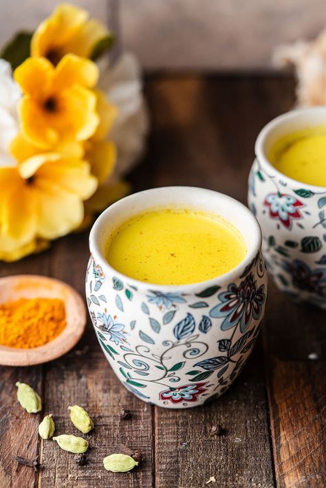 Enjoy the soothing flavors of authentic Haldi Doodh, a traditional Indian beverage rooted in ancient Ayurvedic medicine. This golden elixir, also known as Turmeric Milk, combines milk with earthy turmeric with aromatic spices to create a cozy drink with anti-inflammatory properties. Sipped for generations as a remedy for various ailments, this recipe is a timeless classic that promises both wellness and warmth in every sip. Haldi Doodh, Golden Milk Latte, Healthy Nutrition Plan, Turmeric Milk, Turmeric Latte, Brown Spots Removal, Probiotic Foods, Golden Milk, Turmeric Benefits