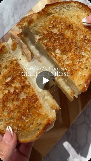 100K views · 1.6K reactions | Starbucks Grilled Cheese 🧀 episode 8 of my grilled cheese was request on TikTok for this copycat recipe! There's a delicious blend of white cheddar, mozzarella on sourdough bread. I added garlic herb butter & grated parmesan on top. So cheesy & DELICIOUS🤌🏼  #grilledcheese #sandwiches #easyrecipes #quickrecipes #latenightsnack #snackideas #easydinner #dinnerideas | Sheila Williams | Dario Lessing · Elfe Starbucks Grilled Cheese, 100k Views, Garlic Herb Butter, Late Night Snacks, White Cheddar, Herb Butter, Sourdough Recipes, Garlic Herb, Copycat Recipe