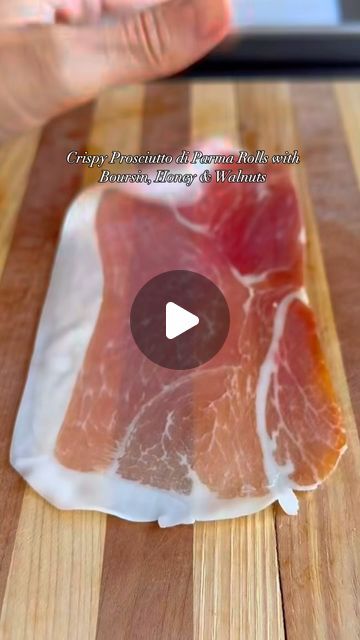 Diane Podlesny on Instagram: "Delight your guests with an irresistible blend of creamy Boursin cheese wrapped in the finest Prosciutto di Parma, pan-fried to crispy perfection. Finished with a delicate drizzle of honey and a sprinkle of fresh walnuts, this appetizer is a perfect harmony of savory and sweet—ideal for any sophisticated gathering.  Ingredients:

	•	12 slices of @galloniprosciutto 
	•	1 package of Garlic & Herb Boursin cheese
	•	2 tbsp honey
	•	¼ cup fresh walnuts, finely chopped

Let’s Make It:

	1.	Lay out each slice of @galloniprosciutto and place a small dollop of Boursin cheese at one end.
	2.	Gently roll up the prosciutto around the cheese, securing tightly.
	3.	Heat a non-stick pan over medium heat. Fry the rolls until the prosciutto becomes crispy and golden, about 2-3 Crispy Prosciutto Wrapped Boursin Cheese, Small Chops Package Ideas, Boursin Cheese Appetizers, Honey Walnut, Boursin Cheese, Cheese Wrap, Cheese Fries, Cheese Appetizers, Garlic Herb