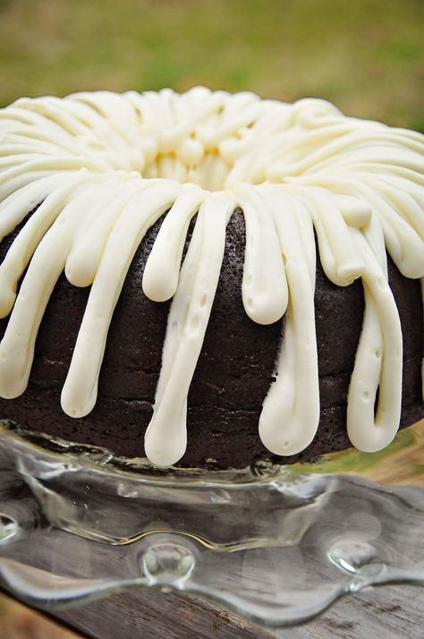 There is just something so delicious about a deep, dark chocolate cake with creamy cream cheese frosting! Here is my version taken from t... Ina Garten Bundt Cake, Chocolate Bundt Cake With Cream Cheese Frosting, Bundt Cake With Cream Cheese Frosting, Chocolate Bundt Cake Decorating Ideas, Bundt Cake Cream Cheese, Bundt Cake Cream Cheese Frosting, Birth Cake, Frosting Cake, Cream Cheese Frosting Cake