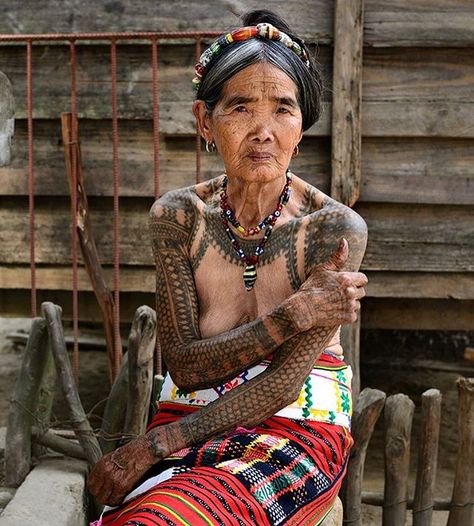 Portrait of Whang-od Oggay, last traditional #kalinga #tattooist at 98 years old. #mambabatok #whangod ♠️ www.facebook.com/TTTism  www.TTTism.tumblr.com ♠️ #TTTism #ContemporaryTattooing  #tattoo #bodyart #illustration #skin #adornment #pain #ritual #tradition #art #craft Whang Od, Filipino Tattoos, Girls With Sleeve Tattoos, Philippines Culture, Filipino Culture, Old Tattoos, Feather Tattoos, Outdoor Photos, Trendy Tattoos