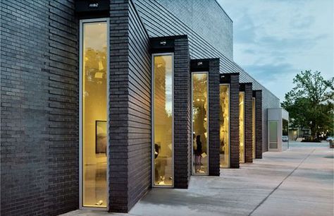 Deborah Berke Partners Bentonville, Arkansas Windows set into successive angles make a sawtooth-shaped brick wall enliven the walk to the Crystal Bridges Museum of Art. Photo © Timothy Hursley: Hallway Doors, 432 Park Avenue, Art Galleries Architecture, Museum Hotel, Clerestory Windows, Black Brick, Brick Architecture, Brick Facade, Design Hotel