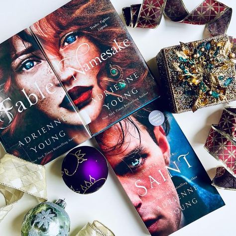 Kariné | Bookstagram on Instagram: "✨ Stunning Book Covers ✨ ❓Do you ever judge a book by its cover❓ I'm often guilty of that 😄 The Fable series by @adrienneyoungbooks in my opinion has one of the most recognizable and stunning book covers. Do you agree? 🤩 Today is also a #bookbirthday for Saint, a prequel to Fable and Namesake. Have you read this series? If so, what were your thoughts? #YAfantasy #fantasybooks #fantasyreads #maritimefantasy #swordandsorcery #fantasyaction #newrelease #boo Fable Aesthetic, Fable Namesake, Fable Fanart, Fable Book, Fable Books, Tbr Books, The Fable, Fantasy Romance Books, Fantasy Books To Read