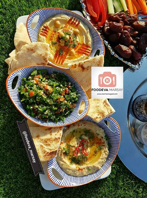 Arabic Mezze - Hummus, Mutabbal and Tabbouleh | Foodeva Marsay Arabic Mezze, Mezze Board, Chickpea Dip, Mediterranean Couscous, Bulgar Wheat, Middle Eastern Restaurant, Tahini Paste, Eggplant Dip, Easy Hummus