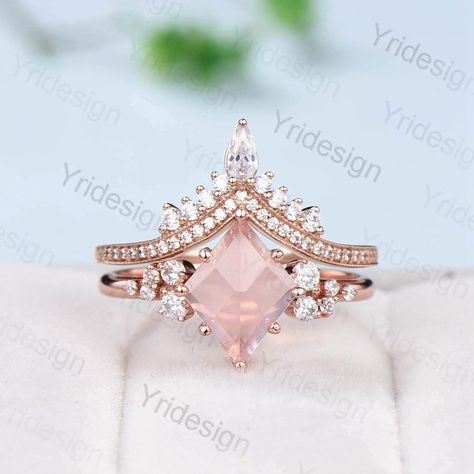 Vintage Rhombus Shape Rose Quartz Engagement Ring Set Pink Quartz Cluster Moissanite Wedding Ring Set Crown Stacking Bridal Ring Set Women ≫≫ Item Details  Make every ring to order, all rings are handmade in the United States.  Metal: Solid 10K & 14K & 18K Gold  Gold Color: Rose gold, Yellow gold, White gold Engagement ring Center stone:  8x10 mm Rhombus Shape Natural Rose Quartz Width::about 1.4mm Accent stone: moissanite Matching band 1: moissanites Single engagement ring here: https://www.ets Rose Quarts Engagement Ring, Rose Quartz Wedding Ring, Rose Quartz Gemstone Wedding Rings, Rose Quartz And Diamond Wedding Ring, Rose Quartz Engagement Ring, Rose Quartz And Opal Engagement Ring, Pink Quartz Ring Engagement, Pink Rose Quartz Wedding Rings, Rose Quartz Ring Engagement