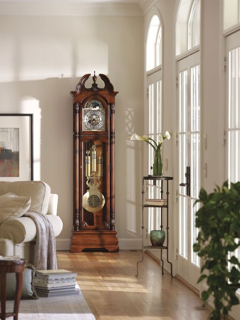 Howard Miller grandfather 611-084 in a classic room setting for Grandfather Clocks. Howard Miller has been building Grandfather Clocks for almost 100 years. Carved Rosettes, Howard Miller, Black Wall Clock, Brown Floors, Antique Clocks, Grandfather Clock, Wooden Clock, Clock Decor, Antique Wall Clock