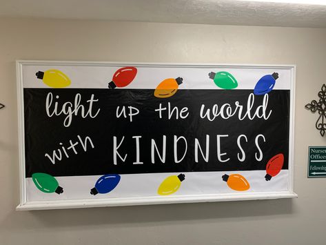 Light Up The World With Kindness Bulletin Board, Christmas Lights Bulletin Board Ideas, Christmas Light Bulletin Board Ideas, Christmas Light Bulletin Board, Light Bulb Bulletin Board, School Counseling Bulletin Boards, Counseling Bulletin Boards, Kindness Club, Door Decorations Classroom Christmas