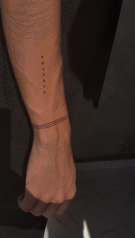 Minimal Roman Numeral Tattoo, Small Back Tats Men, Tattoo That Goes Around Arm, Christian Rib Tattoo Men, Mens Bracelet Tattoo, Small Tats Men, Men S Back Tattoo, Subtle Tattoos Men, One Liner Tattoo