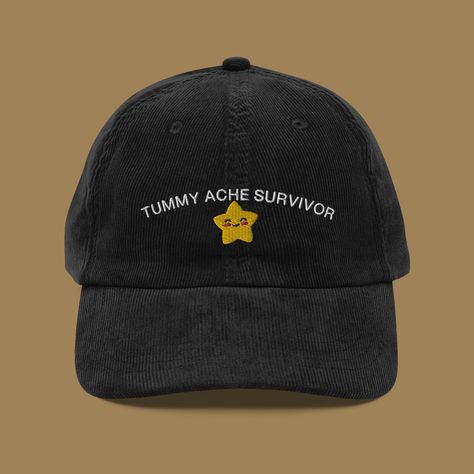 Gear up for a dose of humor and resilience with our Tummy Ache Survivor Corduroy Hat! 🧢 Crafted from soft and breathable 100% cotton corduroy, this embroidered old-school cap is designed to add a playful touch to your everyday style. Design Inspiration: 💡 Embroidered with the witty declaration "Tummy Ache Survivor," this cap is all about celebrating those moments of triumph over discomfort and indulgence. It's a cheeky reminder that life's challenges can be overcome with humor and resilience, Tummy Ache Survivor, Funny Baseball Caps, Silly Shirt, Corduroy Hat, Tummy Ache, Funny Baseball, Baseball Humor, Funny Hats, Note Design