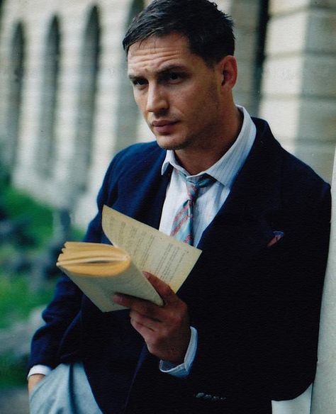 Tom Hardy looking pensive with a well-worn book. توم هاردي, Tom Hardy Variations, Celebrities Reading, Matt Lanter, Nick Bateman, A Man In A Suit, Guys Read, Man In A Suit, Matthew Goode