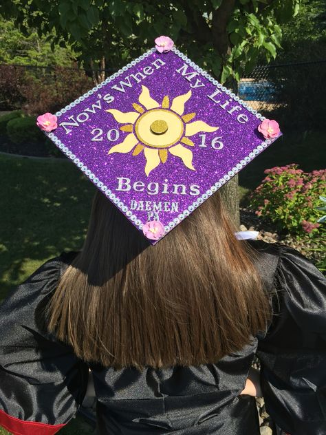 Tangled Graduation Cap! Tangled Senior Crown, Photography Graduation Cap, Purple Graduation Cap Designs, Rapunzel Graduation Cap, Tangled Grad Cap, Purple Graduation Cap Ideas, Tangled Graduation Cap, Disney Grad Caps, Teacher Graduation Cap