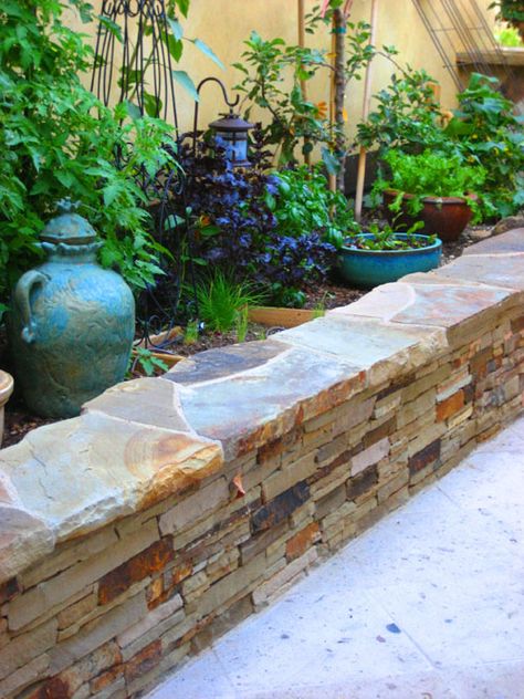 stacked stone as seat wall planter would be really nice along the fence Garden Retaining Wall, Stone Planter, Landscaping Retaining Walls, Garden Floor, Wall Seating, Walled Garden, Stacked Stone, Garden Seating, Wall Ideas