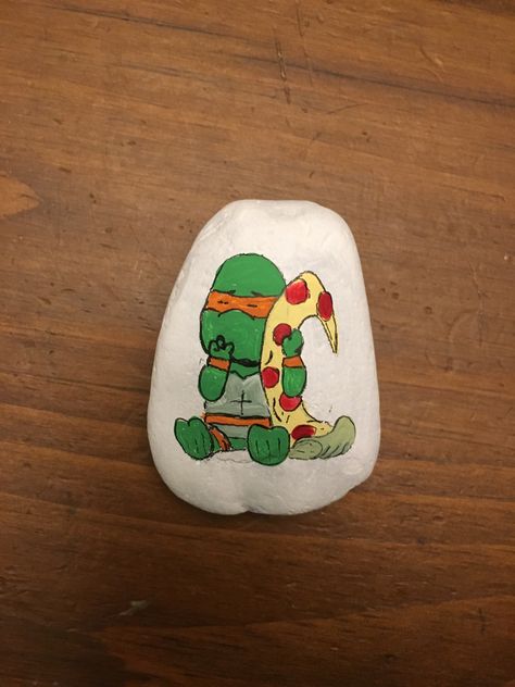 TMNT, Teenage Mutant Ninja Turtles. Michelangelo, pizza. Painted Rock Ninja Turtle Painting, Ninja Turtle Canvas Painting, Teenage Mutant Ninja Turtles Painted Rocks, Tmnt Painting, Ninja Turtle Diy Shell, Ninja Turtles Michelangelo, Turtle Painted Rocks, Turtle Rock, Turtle Painting