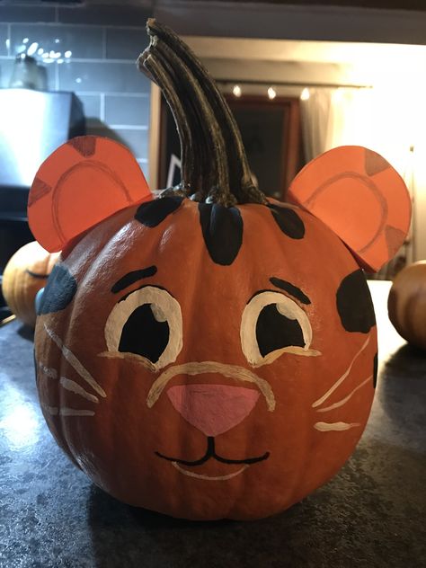 Daniel Tiger pumpkin Daniel Tiger Pumpkin Painting, Tiger Pumpkin Painting, Daniel Tiger Pumpkin, Pumkin Characters, Tiger Pumpkin Carving, Tiger Pumpkin, Cute Painted Pumpkin Ideas, Boys Crafts, Book Pumpkin