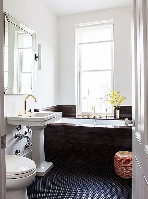 renovation-costs-julia-chaplin-bath Brown Penny Tile, New York Brownstone, Brooklyn House, Penny Tile, Renovation Costs, Gold Fixtures, Brown Bathroom, Bathroom Floor Tiles, Bath Tub