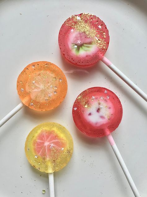 Lollipops made with fruit candy centers, crushed Jolly Rancher hard candies and edible glitter and stars. Jolly Rancher Hard Candy, Fruit Candy, Jolly Rancher, Edible Glitter, Hard Candy, Lollipop, Cooking And Baking, Ice Cream, Candy