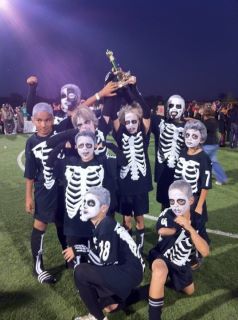 I was in charge of team costumes for the Boo Fest Soccer Tournament.  This is what I came up with....Zombie Soccer Players!  And, the team got first place for the best costume! Halloween Costumes For Soccer Teams, Halloween Baseball Tournament, Team Costumes Sports, Soccer Team Costume Ideas, Halloween Soccer Tournament Costumes, Soccer Team Halloween Costumes, Soccer Player Halloween Costume, Softball Costumes, Soccer Costume