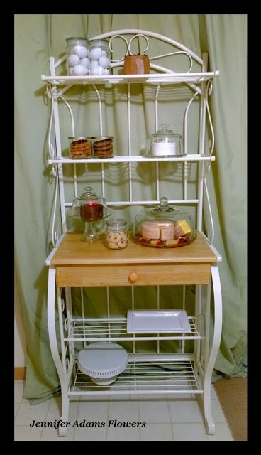 Jennifer Adams Flowers : Bakers Rack (Thanks Mom!)  Jenniferadamsflowers.blogspot.com Bakers Rack Makeover Farmhouse, Bakers Rack Ideas Repurposed, Bakers Rack Ideas, Cleaning And Organizing, Bakers Rack, Living Room Plants, Thanks Mom, Wine Storage, Kitchen Cart