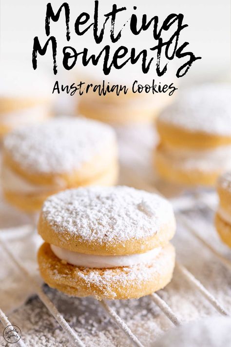 Melting moments cookies are a classic Australian cookie. These dainty cookies are so soft and buttery that they melt in the mouth. They make the perfect cookie for afternoon tea or a party, as they look really impressive but are so easy to make. There is no egg in these cookies, so they are great for those with allergies. Melting moments are filled with delicious buttercream, here, it is flavored with lemon, but you can mix it up with some of my favorite recipe twists. Dainty Cookies, Australian Cookies, Melting Moments Cookies, Light Sandwiches, The Perfect Cookie, Cookie Cake Pie, Melting Moments, Buttercream Filling, Tea Cookies