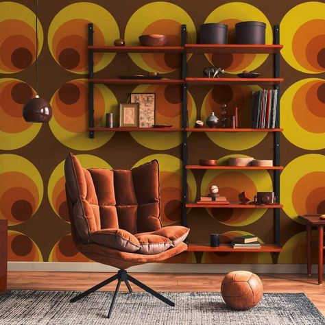 This retro, vintage 70s-inspired wallpaper features a brown background adorned with vibrant yellow and orange circles. Perfect for adding a hippy, mod, or modern touch to any room.