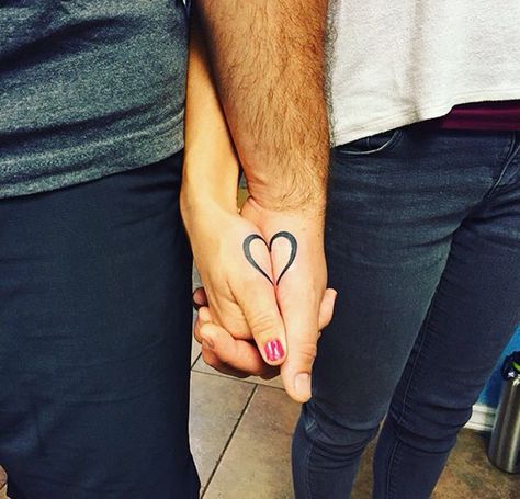 Half Heart Couple Tattoo, Matching Heart Tattoos Couple, Couple Tattoos That Connect, Half Heart Tattoo Couples, Couples Heart Tattoos, Heart Tattoo For Couples, Holding Hands Tattoo Couple, Couple Heart Tattoo, Small Tattoos For Couples Marriage