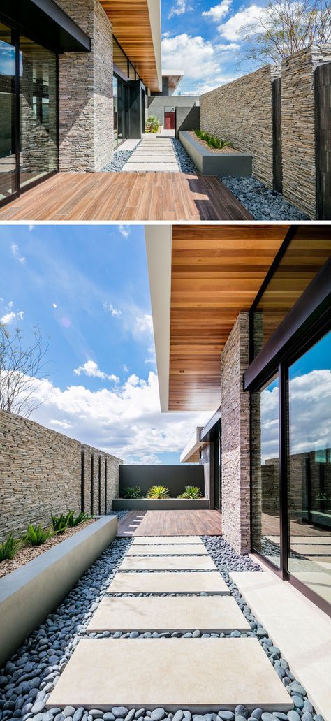 A simple path of pavers and pebbles that leads from the garage to the front door, is hidden behind a stone wall, and a raised planter adds a touch of nature. Patio Decor Ideas, Resort Lifestyle, Patio Rug, Patio Garden Design, Rug Designs, Backyard Garden Design, Contemporary Luxury, Modern Landscaping, Facade House