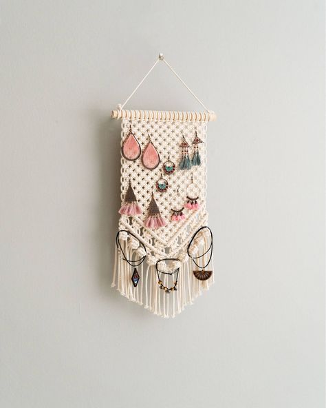 Ever wished your jewelry could hang out in style? Introducing our Macrame Jewelry Hanger—where earring storage meets minimalist decor, perfect for treating yourself or surprising your beloved one with a handmade delight! 👉 Check out more at https://beandaikon.com/products/macrame-jewelry-holder-for-boho-and-scandinavian-earring-storage #artisanmade #macramedecor #bohemiandecor #artisanalpresents #homestyling #supportlocalmakers #bohostyle #homedecorideas #bohoinspo #DiscoverEtsyFinds #home... Macrame Jewelry Hanger, Macrame Products Handmade, Macrame Functional, Macrame Jewelry Holder, Macrame Earring Holder, Diy Earring Holder, Boho Inspo, Treating Yourself, Earring Storage