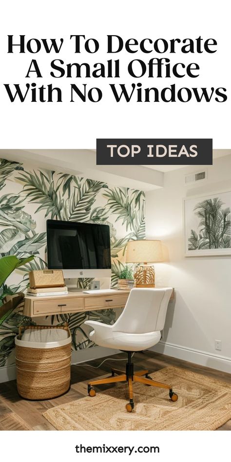 Small office decorated with tropical wallpaper, white desk with computer, ergonomic chair, and wicker plant basket. Small Room One Window Ideas, Cozy Windowless Room, Small Room Without Windows Ideas, Office No Windows Decor, Small Office Ideas No Windows, No Window Office Decor, Office No Windows Ideas, Small Basement Office Ideas No Windows, Office Ideas No Windows