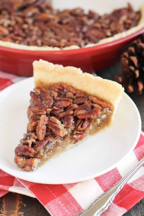 The best Thanksgiving or Christmas dessert is always pie, and pecan is my favorite. Too nervous to make homemade gluten-free pie crust? Don't be! Follow along with this easy recipe, and the use of your food processor, to make a beautiful homemade Pecan Pie. Also made with no corn syrup, this Pecan Pie is nutty, buttery, and sweet, and will quickly become a family favorite! Original Pecan Pie Recipe, Karo Pecan Pie, Pecan Pie No Corn Syrup, Pecan Pie Tarts, Gluten Free Pecan Pie, Gluten Free Pecan, Homemade Pecan Pie, Best Pecan Pie, Pecan Pie Filling