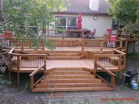 The Complete Guide About Multi Level Decks with 27 Design Ideas | Decks ... Two Level Deck, Multi Level Deck, Tiered Deck, Hot Tub Deck, Hot Tub Backyard, Patio Deck Designs, Wooden Deck, Deck Designs Backyard, Deck Stairs