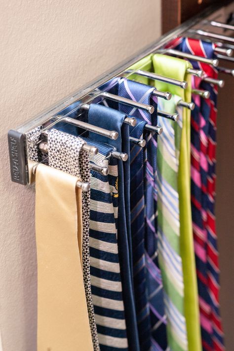 Our slide-out Tie Racks are a popular add-on to our closet designs. The sliding out function provides accessibility and visibility to where all of your ties can shine. Tie Storage Closet, Organizing Ties In Closet, Tie Racks For Closets, Bangle Drawer, Tie Organization Ideas, Tie Storage Ideas, Men Closet Ideas, Mens Closet Organization, Tie Storage