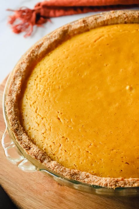 Here is a delicious and easy recipe for keto pumpkin pie. Make a traditional spiced low carb pumpkin pie with almond flour crust or go for a keto crustless pumpkin pie this Thanksgiving, Christmas, or any day you're feeling the pumpkin spice! Pumpkin Pie With Almond Flour Crust, Keto Pumpkin Pie Filling, Keto Pumpkin Pie Filling Recipe, Low Carb Pumpkin Pie Recipes, Keto Pumpkin Pie Crust, Almond Flour Thanksgiving Desserts, Keto Pumpkin Pie Recipes, Almond Flour Pumpkin Pie, Low Carb Pie Crust Recipe