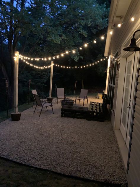 String Lights Backyard, Outdoor String Lighting Ideas, River Rock Patio, Outdoor String Lighting, String Light Ideas, Backyard Cafe, Backyard String Lights, House Renos, Patio Floor