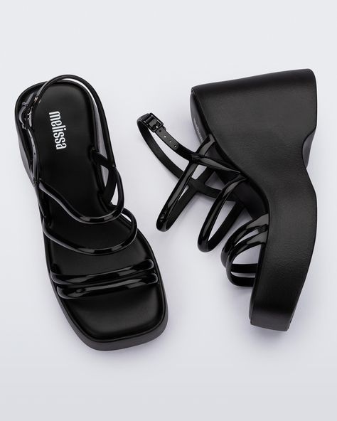 The Melissa Jessie Platform has four narrow straps over the foot and one around the heel, and counts on a buckle fastener that creates the perfect stable fit. It is light and comfortable, and the perfect versatile choice to keep you walking on clouds - both height-wise and comfort-wise! It is perfect for fashion lovers who want a retro-inspired, ultra-high style that is still extraordinarily comfortable. The platform sole extends all the way to the front of the shoe, which makes the wearer feel Dad Jewelry, Dr Shoes, On Clouds, Black Platform, Eva Sole, Pearl Jewellery Earrings, Pretty Shoes, Bag Dress, Cute Shoes