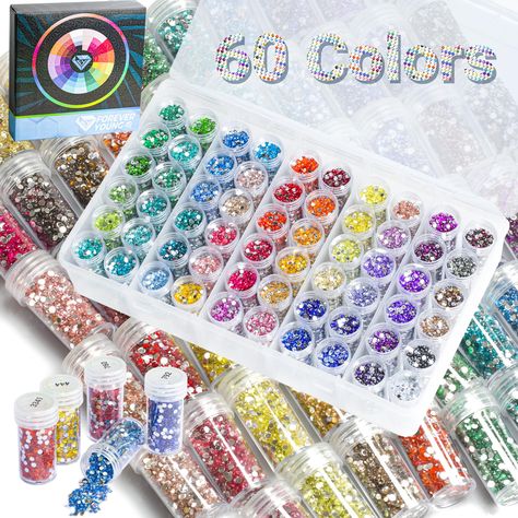 PRICES MAY VARY. PACKAGE INCLUDES：It consists of 1 set 60 color diamonds for diamond painting, 1 set 60 color number diamond painting labels, a spare blank label and a storage container as craft supplies COMPREHENSIVE COLOR：With these 60 basic colors, you can create a similar color scheme that covers all the different colors of diamond paintings, avoiding color shortage, diamond loss and insufficient drilling in the original diamond painting. COVENIENT STORAGE:The storage box is durable and tran Diamond Painting Storage, Painting Storage, Crystal Painting, Transparent Labels, Diy Props, Diamond Paint, Jar Storage, Plastic Bottle Crafts, Painting Accessories