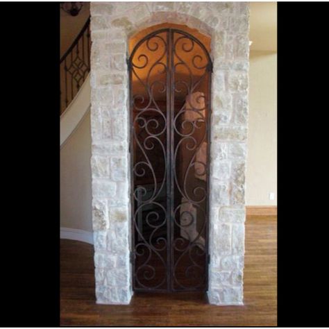 Stone and custom iron door for wine cellar. Indoor Gates, Wine Door, Iron Entry Door, Gates Metal, Wrought Iron Security Doors, Iron Security Doors, Wrought Iron Entry Doors, Iron Ideas, Wine Cellar Ideas