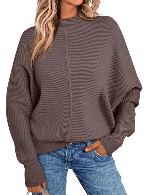 PRICES MAY VARY. Trendy Design: Our oversized sweater features a mock turtleneck, long batwing sleeve,pull over design,trendy knit sweaters adds a touch of style to your fall outfit that is sure to turn heads on the go. Soft&Comfortable: This fall tops is knitted out of premium fabric, gently lay on your skin to keep you warm&cozy. Perfect choice for autumn and cold winter days! Easy Match: Easily throw this batwing sweater on with slacks, jeans, skirts or other bottoms for a stylish look! Trend Amazon Sweaters For Women, Trendy Knit Sweaters, Fall Tops For Women, Casual Chic Fall, Fall Fashion Jeans, Sweaters Trendy, Tops Fall Outfits, Batwing Sweater, Oversized Sweater Women