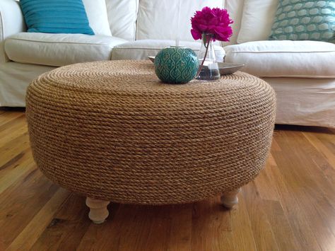 My tire and rope coffee table is DONE! I LOVE the way this came out. It's just as awesome as the $600+ abaca coffee table I was eyeing and it only cost about $70 for the rope, glue, and plywood. The tire was free from Les Schwab! Rope Ottoman, Tire Ottoman, Tire Table, Diy Muebles Ideas, Diy Ottoman, Old Tires, Coastal Living Rooms, Coastal Bedrooms, Rope Crafts