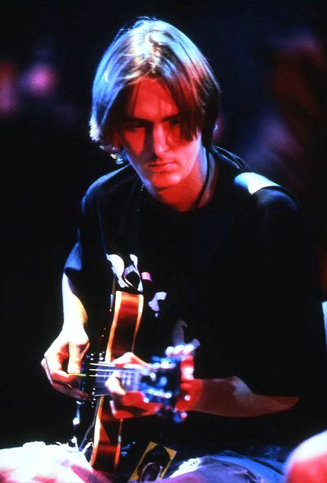 Mike Mccready from Pearl Jam sitting and playing the Guitar in a concert, 1995. Mike Mccready, Mad Season, Alternative Metal, Eddie Vedder, Room Redo, Pearl Jam, Rare Photos, Cool Bands, Guitarist