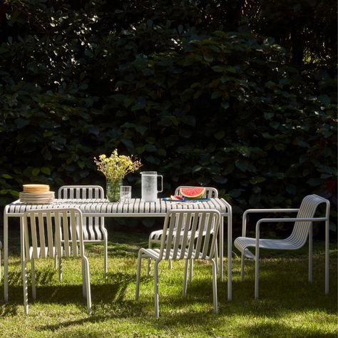 The Palissade collection from HAY is engineered to reproduce the same visual simplicity and core strength throughout. Designed in colour and form to integrate effortlessly into a natural landscape or urban setting, Palissade is intended to be used over a longer period and become more beautiful over the years. Browse the whole collection at andlight.com. Hay Outdoor, Hay Outdoor Furniture, Hay Table, Ronan Bouroullec, Log Home Plan, Deck Makeover, Contemporary Outdoor Furniture, Design Online Shop, Table Garden